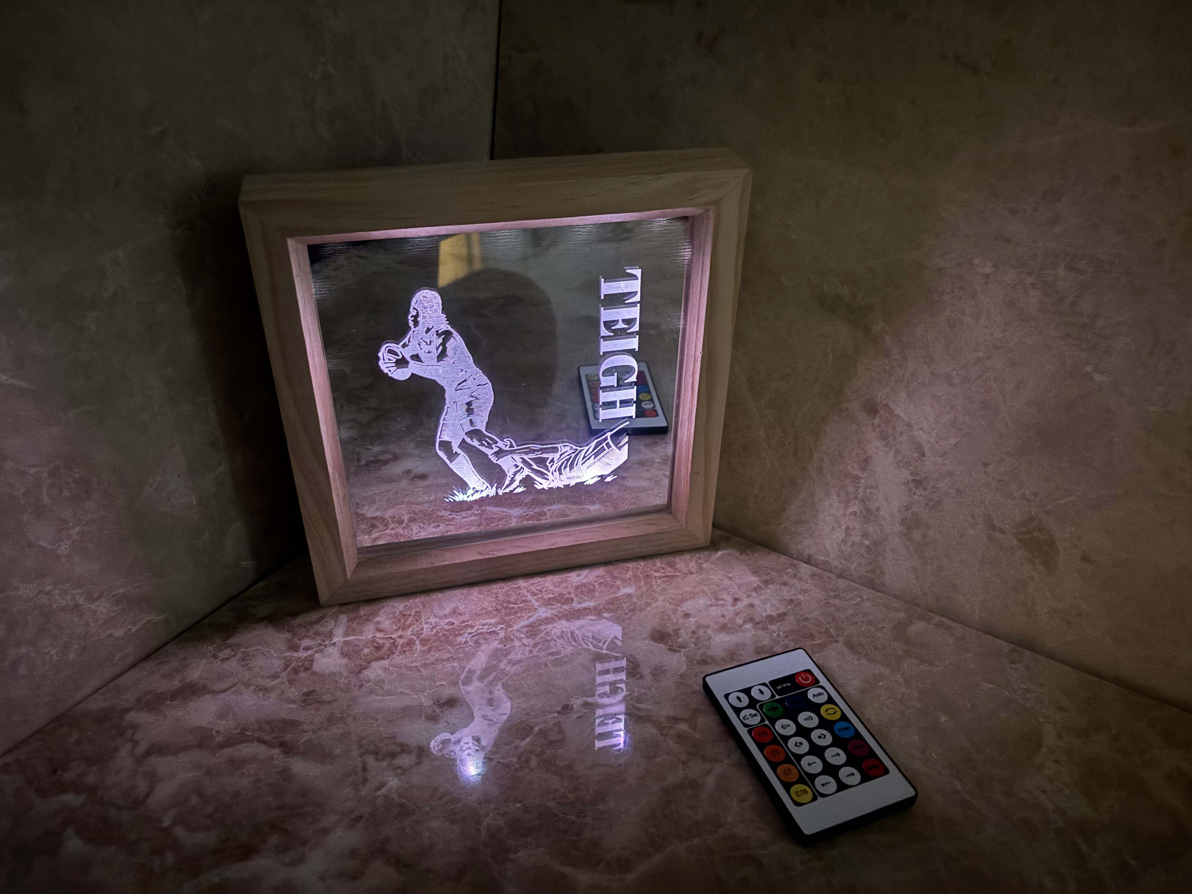 'Moments that Glow' customised LED mirrored frame